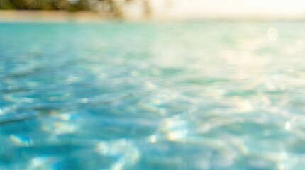 Fototapeta premium Abstract Blue Water Surface Background with Sparkling Light Reflections and Bokeh Effect