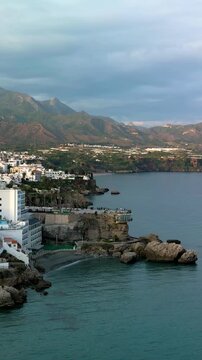 Aerial vertical view of Nerja picturesque town and one of the most famous viewpoints on the Costa del Sol &ndash; Balc&oacute;n de Europa