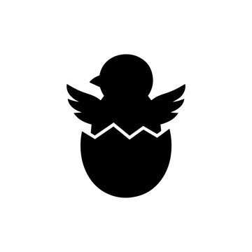 Simple black silhouette of a small chick hatching from an eggshell, isolated on a white background, for easter and spring