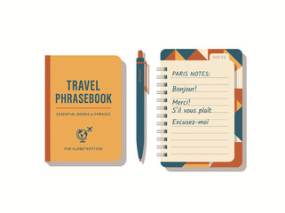 Travel phrasebook and notepad with French notes for a trip to Paris. © Gilang