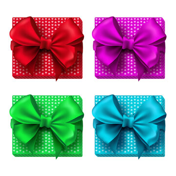 Colorful gift boxes wrapped with heart patterns and bows