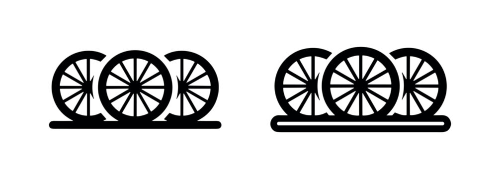 Wooden wagon wheels icon set. Simple black and white vector symbol for vintage transport, history, and rustic design.