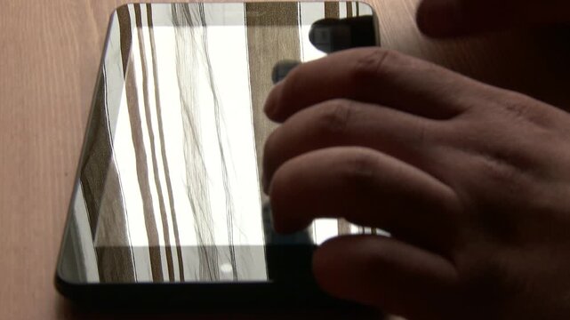 4K Using Tablet on Table