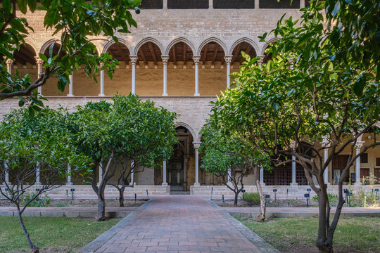 Pedralbes Monastery Courtyard with Orange Trees and Gothic Cloister, Barcelona, Historic Stone Architecture, Arches, Garden Path