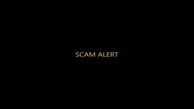 Yellow SCAM ALERT text animation on a black background, creating a warning notification concept for fraud, security risk and online safety.