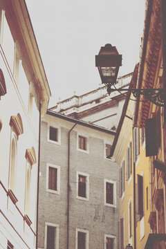 half tone vintage print of street in rome old street lamp