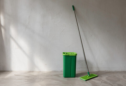 Cleaning mop and bucket still life