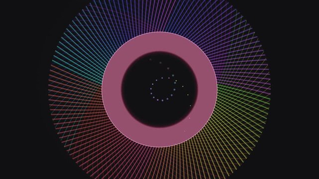 Abstract circular motion graphic featuring glowing light trails and spinning colored dots animation.