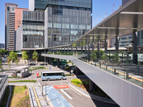 View of Modern Buildings and Pedestrian Bridge in a Osaka City