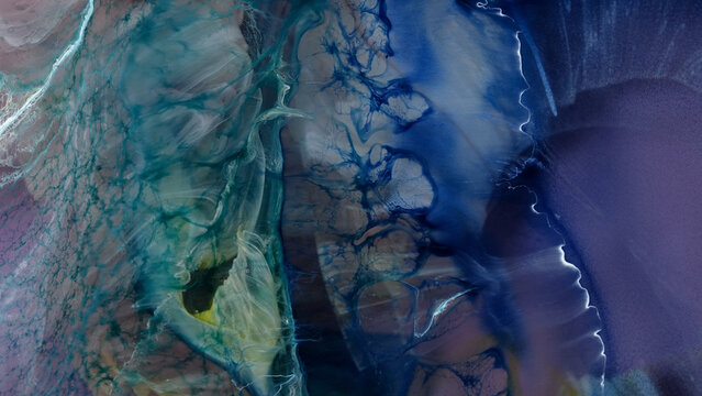 Flowing patterns of alcohol ink mixed with epoxy resin in art