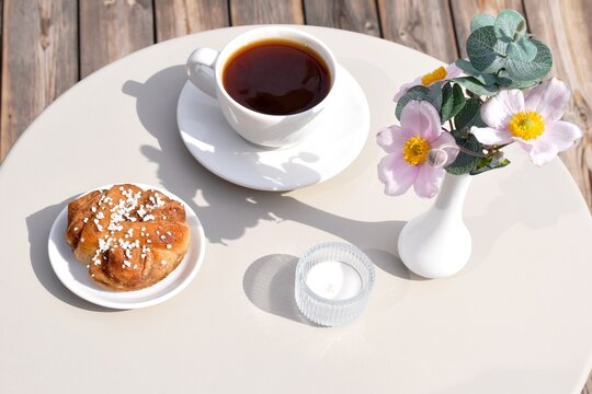 Swedish cinnamon bun with coffee. Swedish fika
