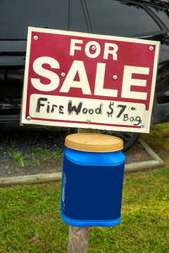 Firewood for sale sign with honor system money box