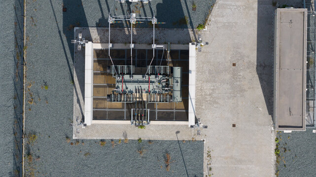 Aerial view of Large Oil-Cooled High-Voltage Transformer in Electrical Substation