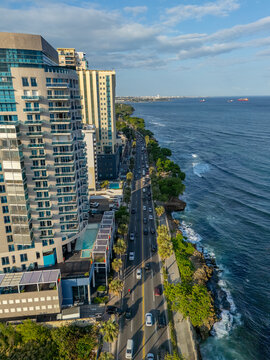 Aerial view of the Santo Domingo Malecon, George Washington Avenue, luxury high-rise buildings, and the Caribbean Sea in Santo Domingo, Distrito Nacional, Dominican Republic.