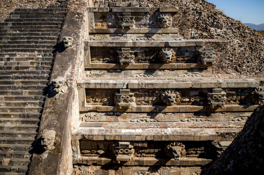 Stone faces carved into a temple at Teotihuacan in Mexico City.