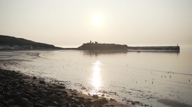 Sun low over Peel Castle, Isle of Man