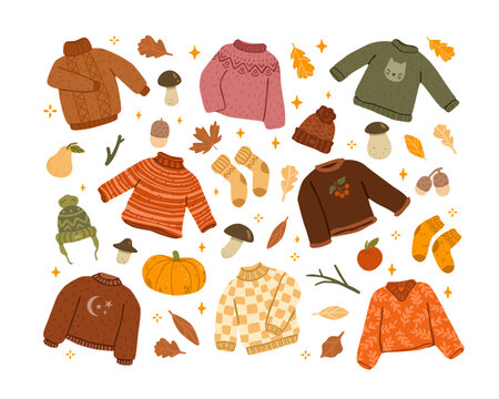 Flat vector illustration of a cozy autumn clothing collection decorated with sweaters, hats, socks, pumpkins, mushrooms, leaves, fruits and woodland elements for fall and winter seasonal design.