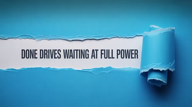 Torn blue paper revealing white space with text message about drives