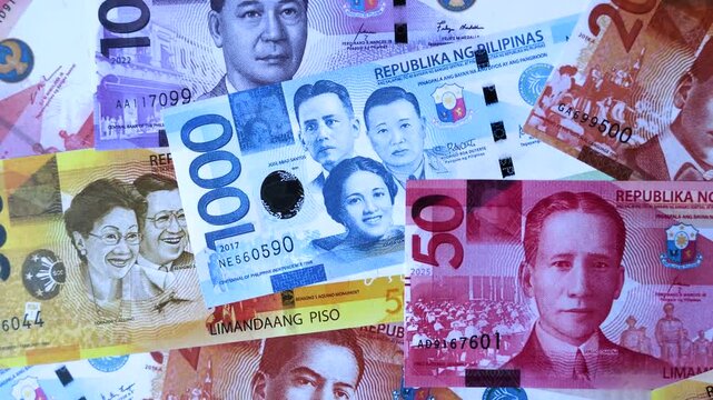 Philippines, Philippine peso banknotes and coins as a medium of trade and exchange. Philippine peso currency as a background for your design