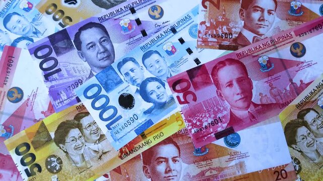 Philippines, Philippine peso banknotes and coins as a medium of trade and exchange. Philippine peso currency as a background for your design