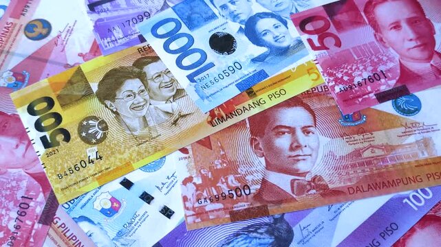 Philippines, Philippine peso banknotes and coins as a medium of trade and exchange. Philippine peso currency as a background for your design