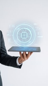 Business hand balancing tablet with circular blue AI interface hologram in photographic style on white background, concept of machine learning and automation