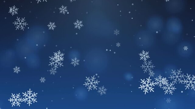 Abstract winter background with falling snowflakes and motion blur effect.