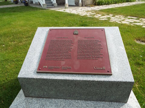 Gatineau, Quebec, Canada &ndash; June 9, 2026: A bilingual historical plaque from the Historic Sites and Monuments Board of Canada details the "heritage of L'Auberge Symmes" on  R.Front.