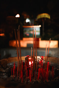 View of burning incense sticks in a stone vessel at The Marble Mountains in Da Nang, Da Nang, Vietnam.