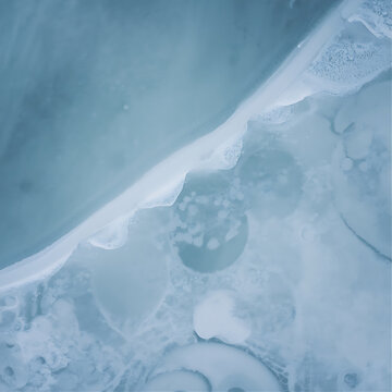 Abstract blue alcohol ink texture. Fluid paint background with soft marble effect.