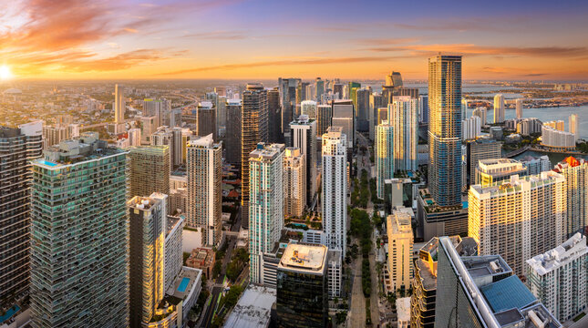 View from above of skyscraper buildings in downtown district of Miami, Florida, USA. American city with business financial district at sunset