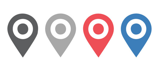 Set of four map location pins in different colors for navigation and geographic interface design use. © MdNasir