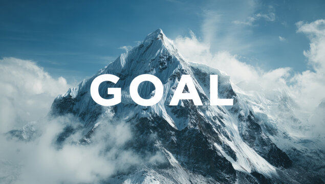 Goal word on snow-capped mountain peak, symbolizing aspiration, challenge, and reaching success