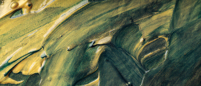 Dark green and gold abstract textured paint background with flowing diagonal brushstroke patterns