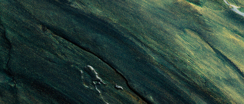 Abstract green oil paint texture with diagonal brush strokes and pattern