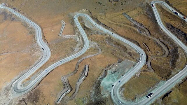 Timelapse aerial drone footage of the Too-Ashuu Pass in Kyrgyzstan, capturing the traffic along the winding Bishkek&ndash;Osh highway through the Tian Shan mountains.