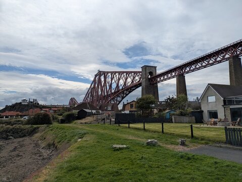 Edinburgh, UK - 19 April 2025. Forth Bridge in Scotland, a UNESCO World Heritage site since 2015, connects Edinburgh to Fife, showcasing stunning architecture.