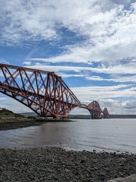 Forth Bridge in Scotland, a UNESCO World Heritage Site, renowned for its engineering and stunning views over the Firth of Forth.
