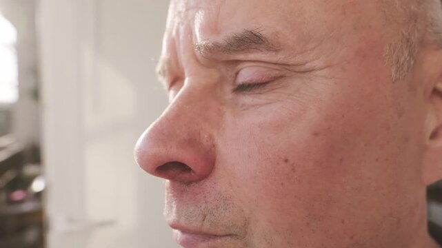 hands examining irritated nose an older patient, closeup facial skin, medical checkup, inflammation, dermatology care, seasonal flu symptoms requiring medical attention and treatment, health assessmen