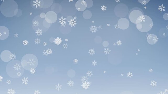Abstract motion graphic of falling snowflakes and bokeh on a soft blue background, perfect for winter and holiday themes.