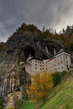 Predjama Castle (Predjamski grad), Renaissance fort built for defense under a natural rock arch high in the mountain stone wall. Postojna-Slovenia-200