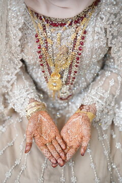 Henna art on bridal hands