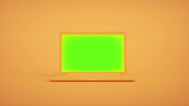 Modern Laptop With Green Screen on Vibrant Orange Background