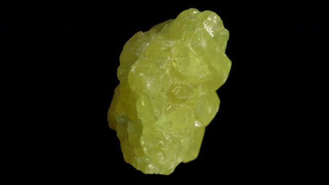 Natural sulfur crystals isolated on a black background