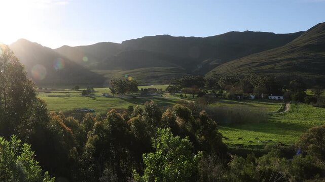 sunset light falling on farmland, Stanford, South Africa