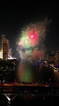 Colorful New Year Fireworks Over Bangkok, Thailand's Chao Phraya River