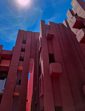 Calpe, Spain - May 27, 2026.View of geometric towers at La Muralla Roj in Calpe, Spain under bright sunlight with a dramatic angle