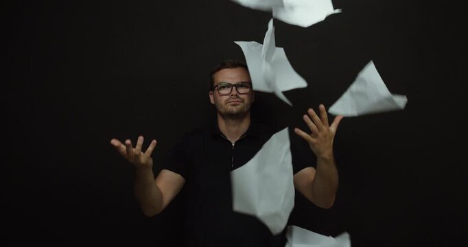 Frustrated Man Throwing Papers into the Air in Slow Motion