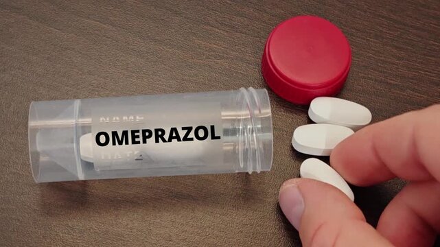 OMEPRAZOL proton pump inhibitor topic for GERD and acid reflux tablet taken by a patient