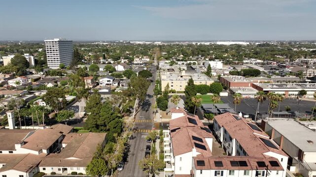 Long Beach, California, USA - Aerial View of Bixby Knolls Residential Urban Neighborhood With Commercial Buildings at Sunset